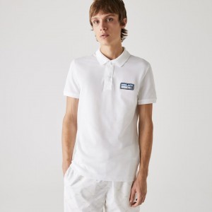 Camiseta Lacoste Slim Fit Solid Cotton Piqué Polo With Badge Hombre Blancos | SP9-75397V0